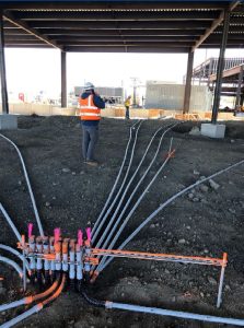 Electrical conduit being laid for administration expansion building
